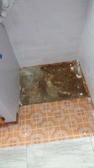I guess they didn't have enough lineoleum for under the washing machine?