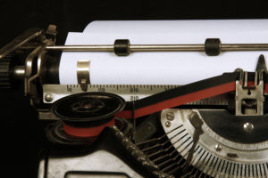 Close up of a typewriter. Add your own message text to image.