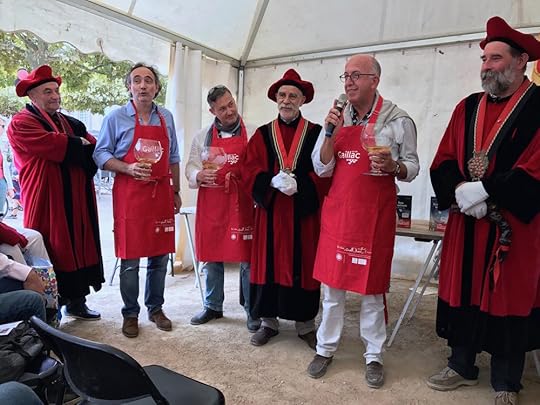 The tough life of a writer of wine mysteries: Induction ceremony to become members of the Gaillac Wine Brotherhood of the Dive Bouteille.