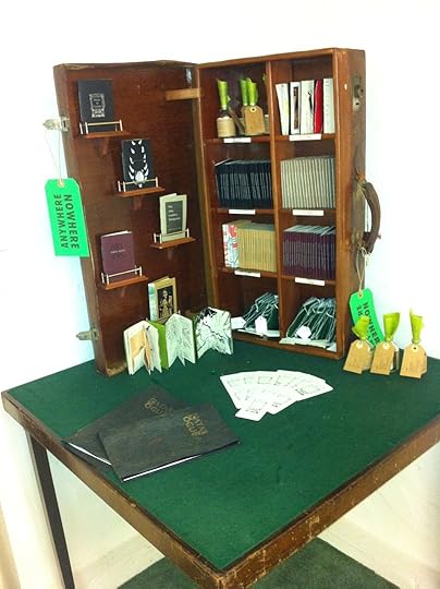 The Suitcase Library by Pig Ear Press