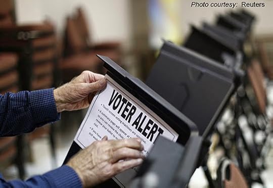 voter-alert-sign-on-voting-machine