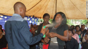 Orophet Lethebo Rabalago sprays Doom insecicide at people to 