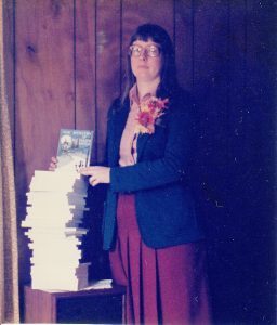 Kathy with her first stack of author copies