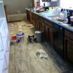 new floor really is gorgeous. See how I fixed that hole at the end of the room?