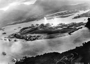 Aerial view of Ford Island in Pearl Harbor during the Japanese attack, 7 Dec 1941; photo taken from a Japanese aircraft (US Naval History & Heritage Command)