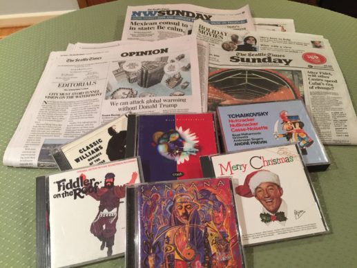 newspapers and music CDs
