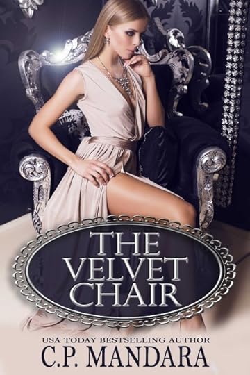 sexy blond in beige silk dress sitting on the black armchair