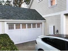 Garage roof with glass solar panels
