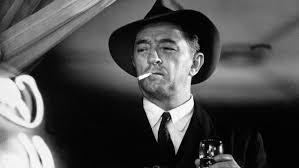 Robert Mitchum as Philip Marlowe in 