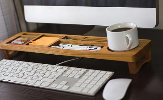 This desk organizer comes in lots of different finishes on their Etsy store: iWoodDesignUSA
