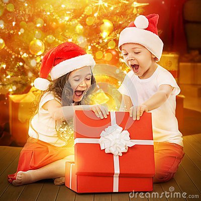 happy-kids-santa-hat-opening-gift-box-colorful-lights-christmas-tree-background-holidays-christmas-new-year-x-47547808