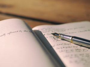 Notebook and pen