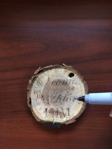 Making Christmas ornaments out of tree branches, step 2