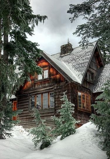A log cabin tucked into the mountains: 