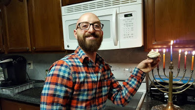Benjamin Rubenstein celebrating his birthday and Hanukkah with his family and epic beard