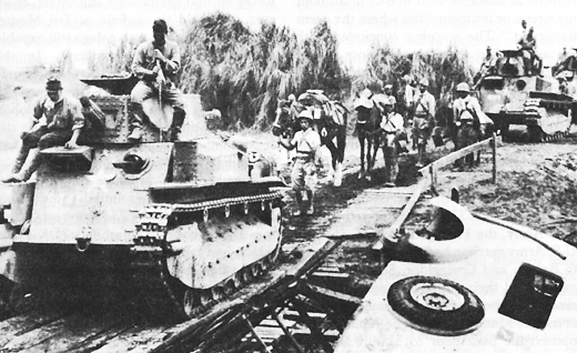 Japanese light tanks advancing on Manila, 2 Jan 1942 (US Army Center of Military History)