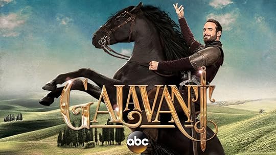 Galavant, a handsome knight, poised on the back of a rearing black horse, his hand held up in a flourish. The background is an idyllic fantasy countryside, and the title of the show is printed across the foreground.