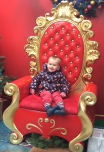 Sammy sat in big red chair