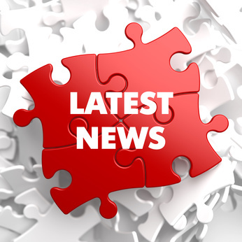 Latest News Concept on Red Puzzle on White Background.
