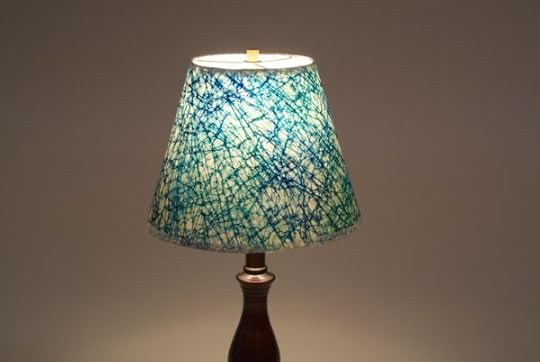 Wraparound lampshade featuring Nepalese lokta paper.