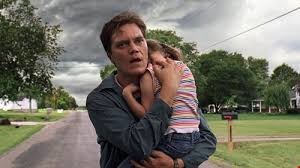 Michael Shannon and Jaeden Lieberher in