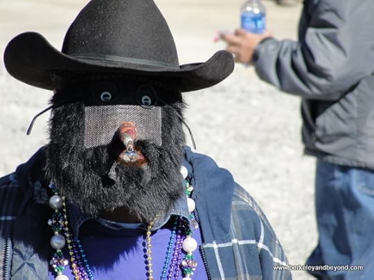 masked man in Iowa Chicken Run in Iowa, Louisiana