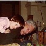 the author as a small child on her father's back