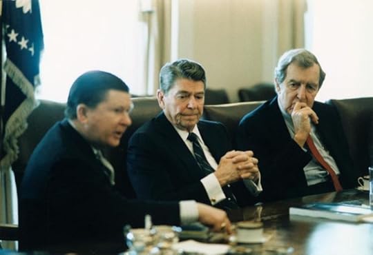 President Reagan receiving the tower commission report in the Cabinet Room, 1987 via Wikipedia.