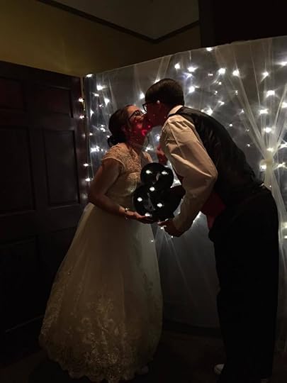 Image may contain: one or more people, people standing, wedding and indoor