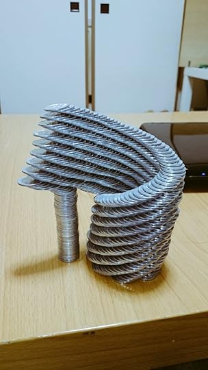 spiral of stacked coins balanced