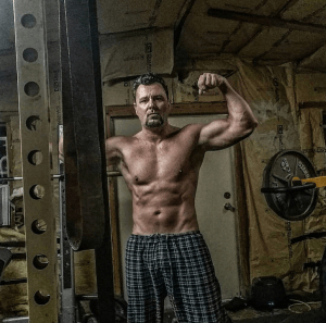 49 year old man flexing