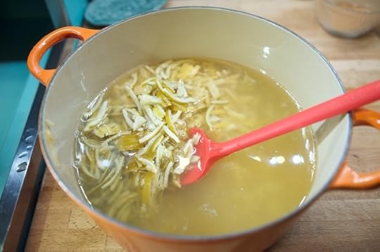 combining ingredients in the pot for lemon lime marmalade
