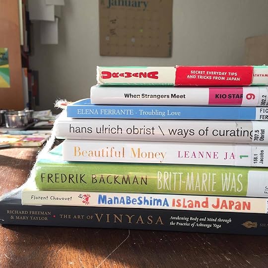 This week's reads. Just finished the novel Britt-Marie Was Here and starting Troubling Love. Really enjoying When Strangers Meet - very important message for us now as we need to focus on our common humanity and not differences being used to divide us. Beautiful Money is helping me keep my financial game healthy and happy. Urawaza is odd, funny and useful. Loving how Ways of Curating is making me think about art differently. The Island Japan book is a great way to see an illustrated adventure. The Art of Vinyasa is my teachers' book that I got last night at their signing. Can't wait to dive in. What are you reading today?