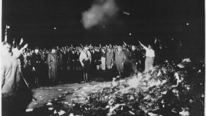 lossy-page1-1005px-thousands_of_books_smoulder_in_a_huge_bonfire_as_germans_give_the_nazi_salute_during_the_wave_of_book-burnings_that_-_nara_-_535791tif-jpg__800x450_q85_crop_upscale
