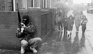 A Belfast man on patrol for the Irish Republican Army, 1987. Pacemaker Press International/Belfast Telegraph Archive