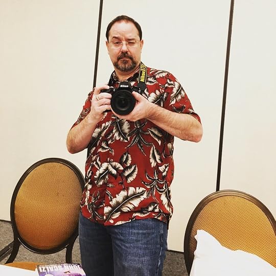 I had a camera face-off with John Scalzi - his Nikon DSLR vs. my iPhone 6S Plus. Notice his conveniently placed copy of his forthcoming novel, The Collapsing Empire...