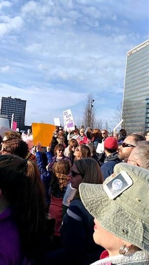 Image may contain: 1 person, sky, crowd, cloud and outdoor