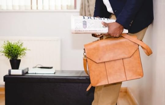 newspaper and briefcase 