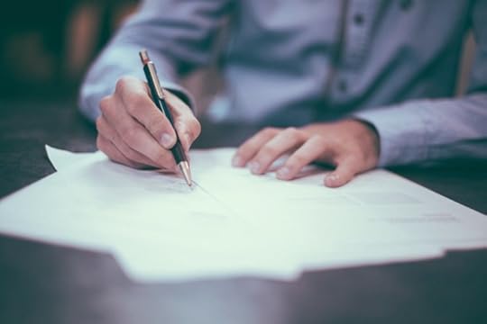 Man Writing by Unspalsh. CC0 Public Domain by Pixabay.