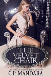 sexy blond in beige silk dress sitting on the black armchair
