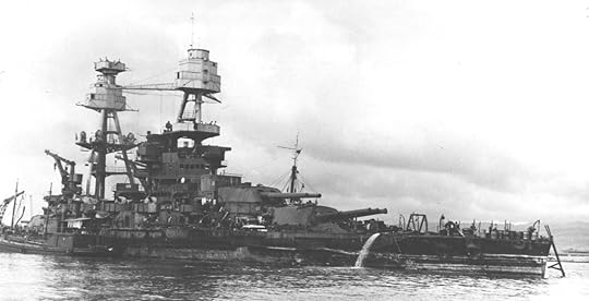 Battleship USS Nevada refloated after being sunk on 7 Dec 1941 and ready to be moved to dry dock, Pearl Harbor, Hawaii, 17 Feb 1942 (US Navy photo)