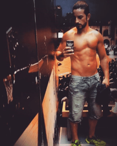 personal trainer Licinios Gois checking his progress after a workout in the United Arab Emirates