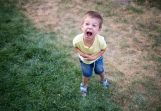 kid shouting and crying during a temper tantrum
