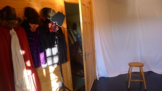 Costumes hanging on the wall in the two-room cabin that is Howard's office and theatre studio