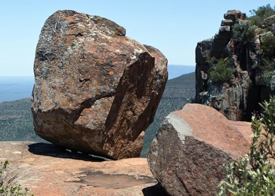 Perhaps the huge size of an average boulder contributed to the preservation of an extra letter in its name?
