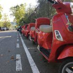line of Vespa scooters for rent