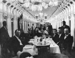Men dining in the Main Cabin of the Crescent City