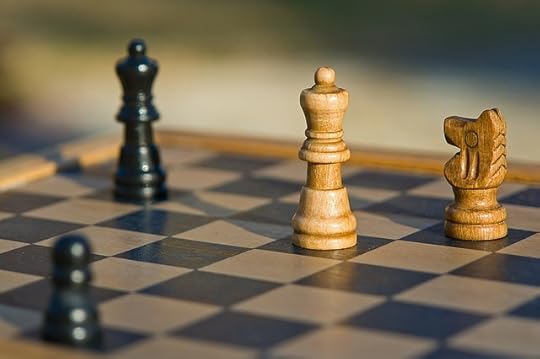 Chess figure game play by Devanath. Public domain via Pixabay.