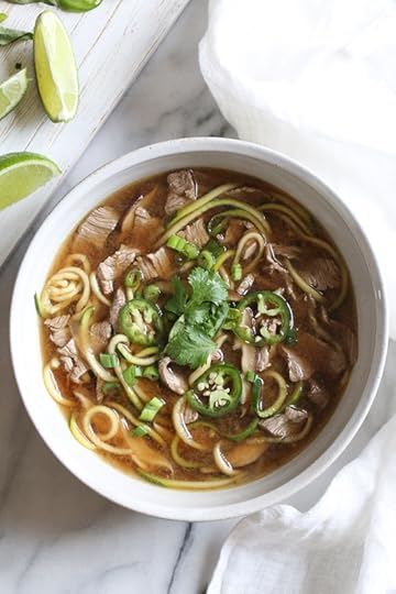 A quick, flavorful Vietnamese-inspired nood-less pho subs zucchini for rice noodles. So easy, the steak is sliced thin and cooks less than a minute in the ginger-garlic beef broth. Top this with fresh lime, basil, cilantro, jalapeno and scallions and you have one tasty faux pho!
