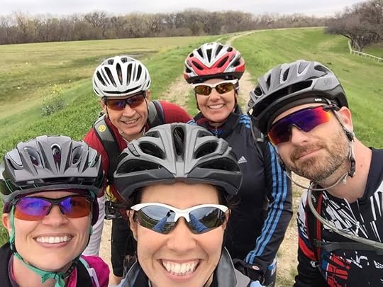 Image may contain: 5 people, people smiling, outdoor and nature